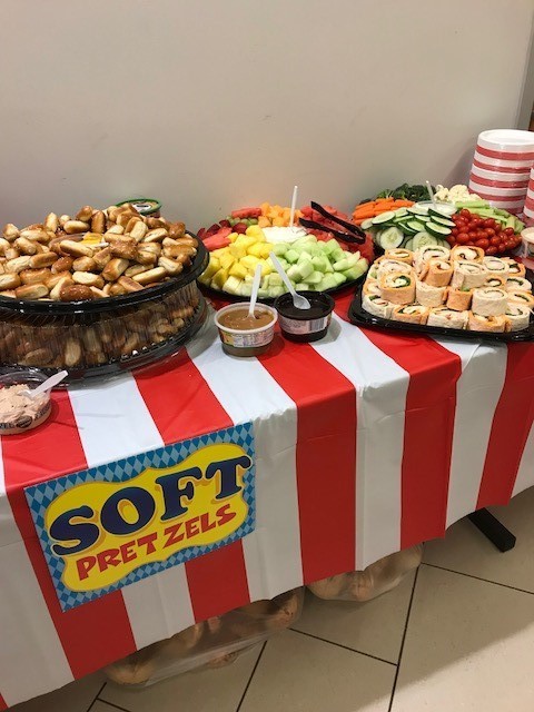 carnival table with lots of food